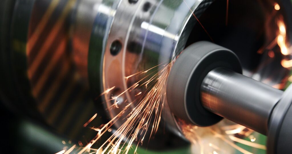 Finishing metal working on high precision grinding machine in workshop